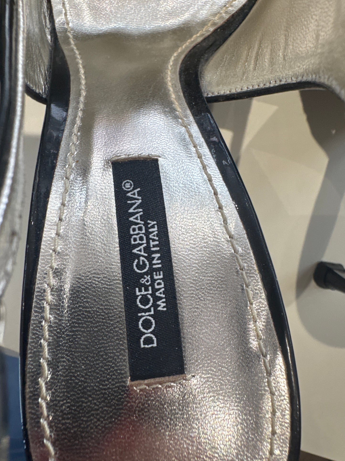 Dolce & Gabbana pony hair sling back heels.