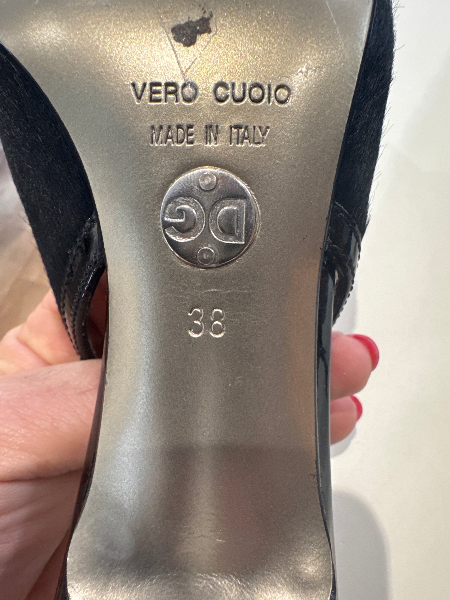 Dolce & Gabbana pony hair sling back heels.