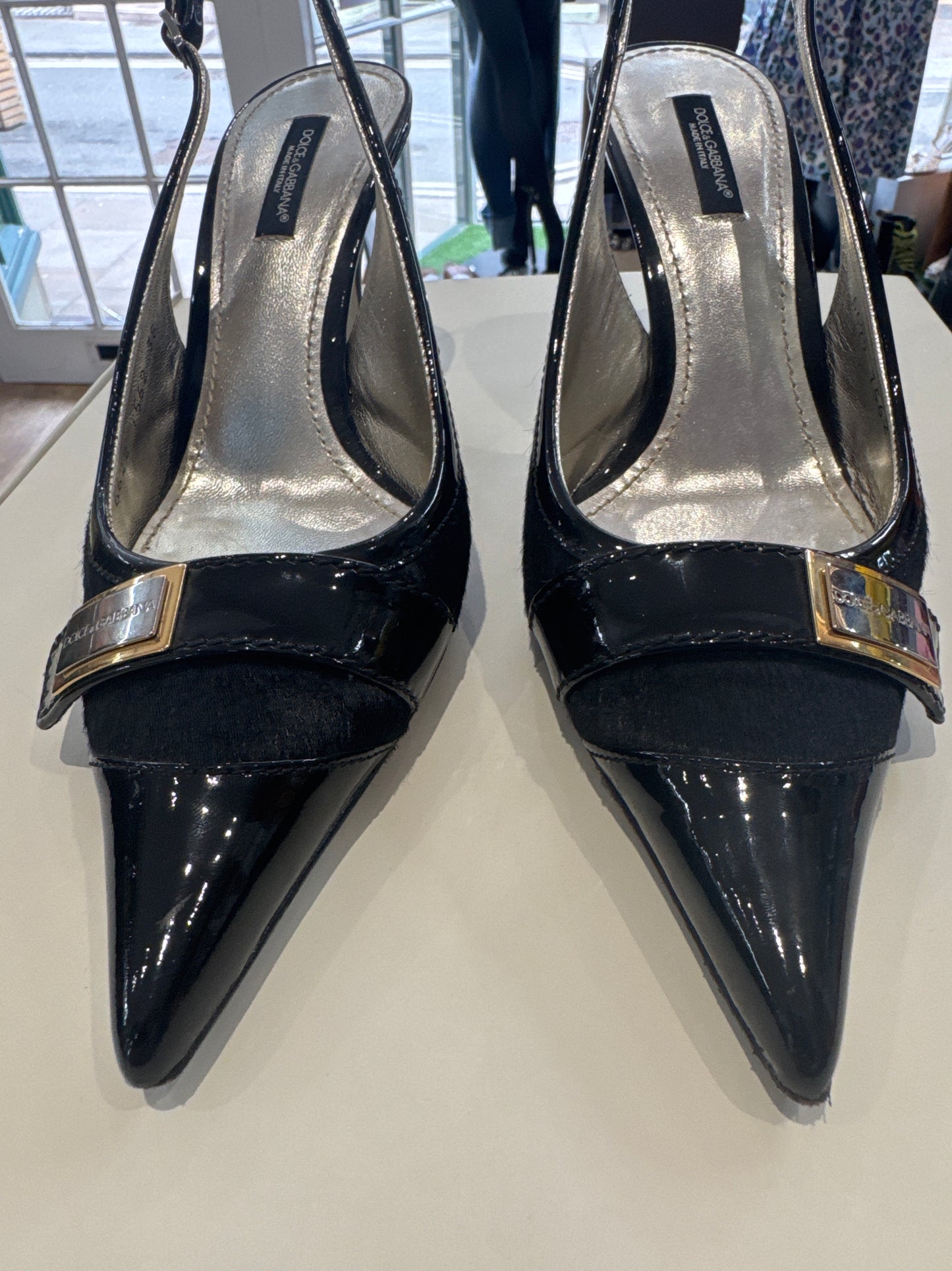 Dolce & Gabbana pony hair sling back heels.