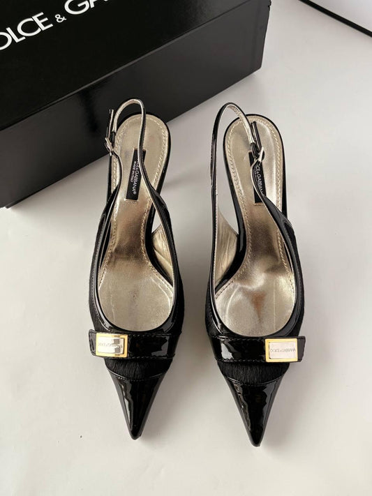 Dolce & Gabbana pony hair sling back heels.