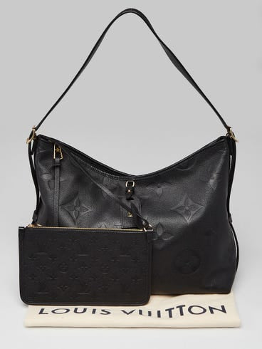 LOUIS VUITTON
Black Monogram Giant Empreinte Leather Carryall MM Bag