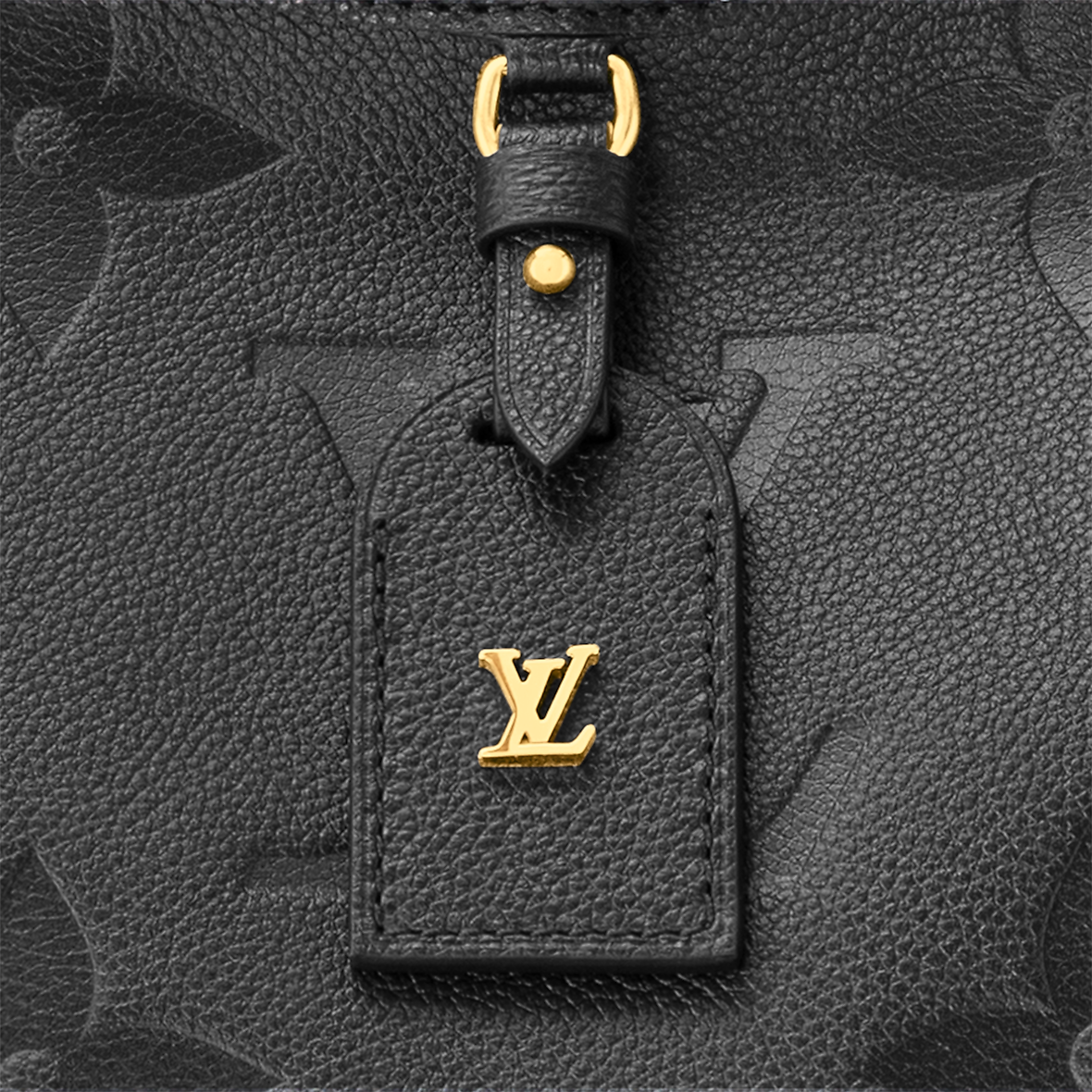 LOUIS VUITTON
Black Monogram Giant Empreinte Leather Carryall MM Bag